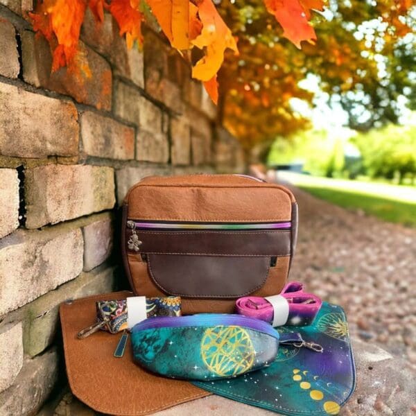 Brown leather bags and pouches.