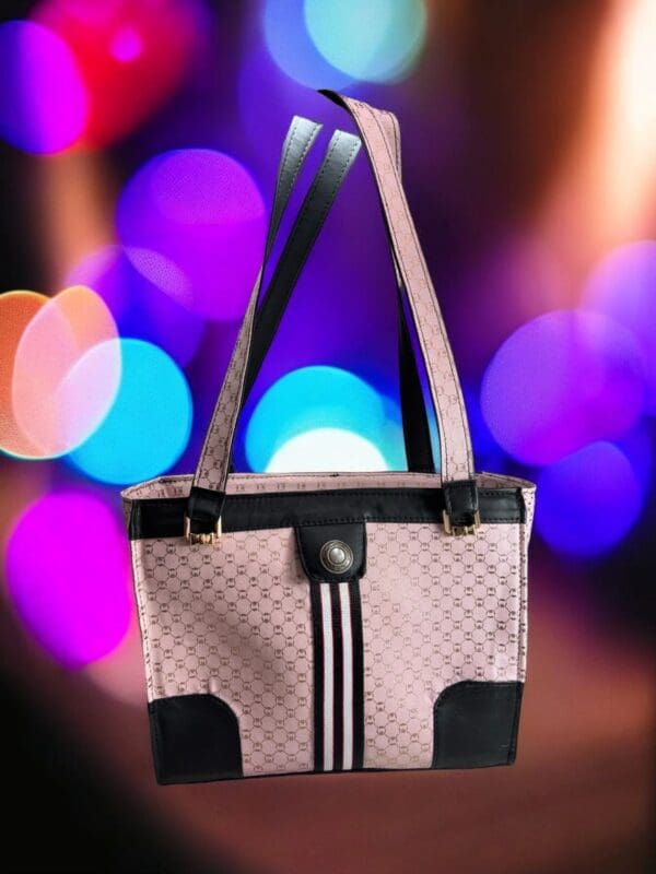 Pink and black monogram tote bag.